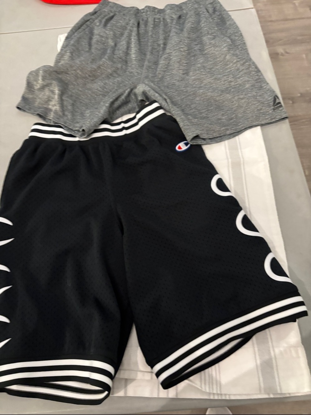 Champion Black Shorts with White Trim and Reebok Gray shorts
